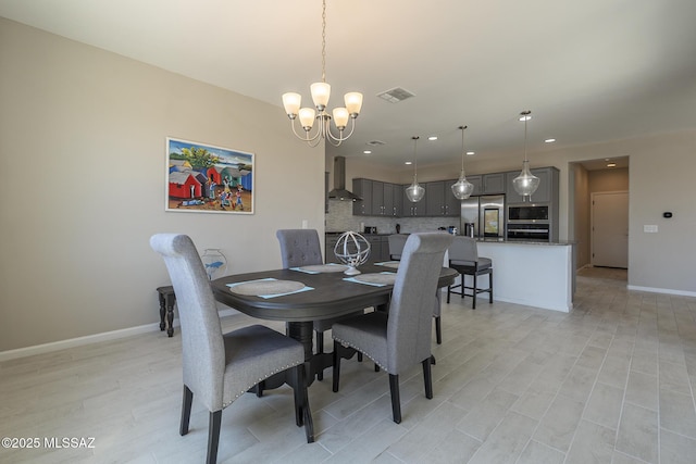 5369 S Sierra Prieta Trl, Tucson, AZ 85747 - dining area featuring light wood finished floors, baseboards, visible vents, recessed lighting, and a chandelier