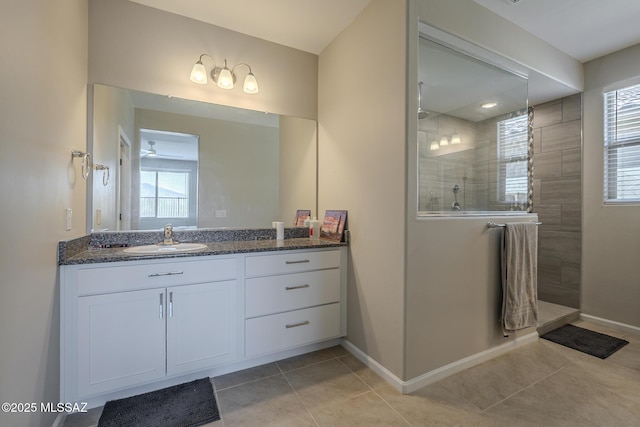 5369 S Sierra Prieta Trl, Tucson, AZ 85747 - full bath featuring tile patterned floors, baseboards, a walk in shower, and vanity
