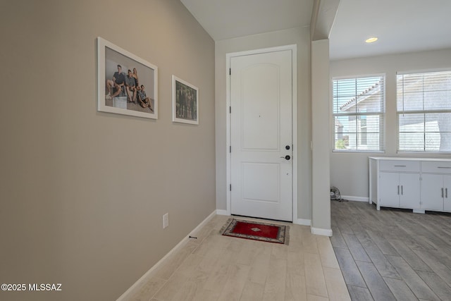 5369 S Sierra Prieta Trl, Tucson, AZ 85747 - entryway with light wood-type flooring and baseboards