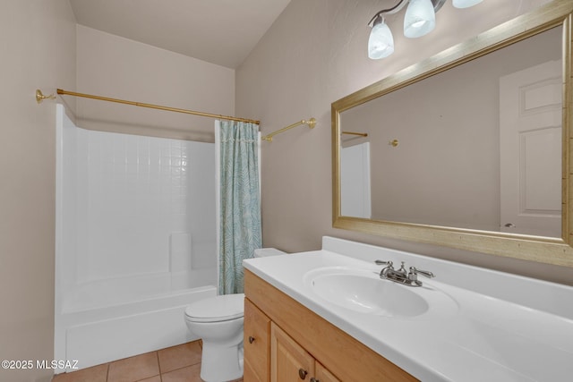 bathroom with toilet, shower / bath combo, tile patterned flooring, and vanity