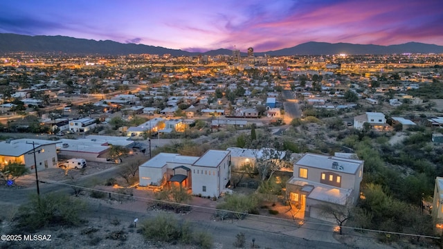 aerial view at dusk with a mountain view