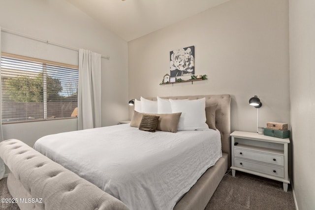 carpeted bedroom featuring lofted ceiling