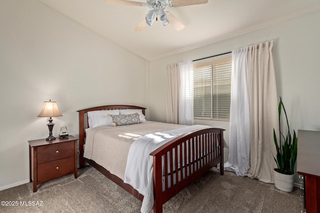bedroom with a ceiling fan, lofted ceiling, and carpet