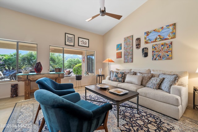 37561 S Desert Sun Dr, Saddlebrooke, AZ 85739 - living room with a ceiling fan, high vaulted ceiling, and baseboards