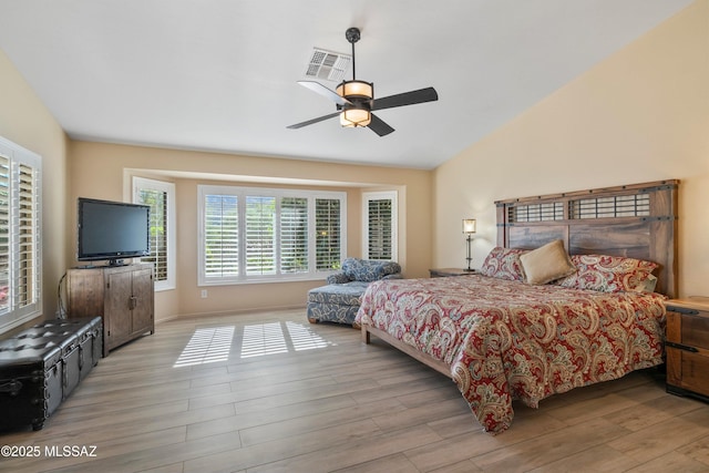 37561 S Desert Sun Dr, Saddlebrooke, AZ 85739 - bedroom featuring visible vents, wood finished floors, a ceiling fan, and lofted ceiling