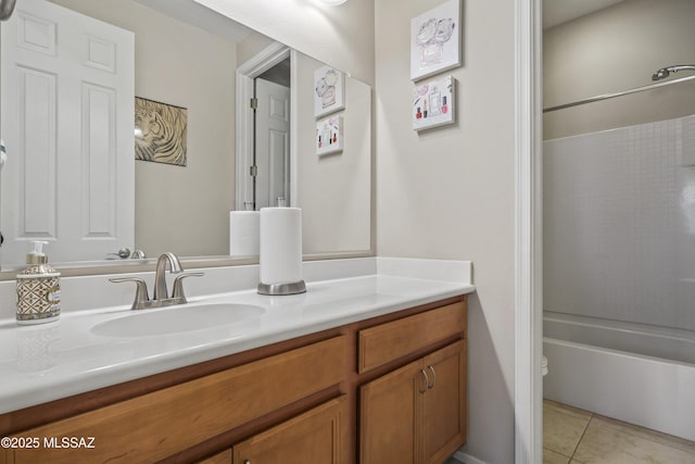 full bath featuring tile patterned floors, toilet, tub / shower combination, and vanity