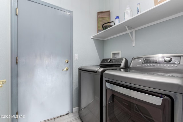5305 N Via Ln, Doncella, Tucson, AZ 85750 - clothes washing area with washing machine and dryer