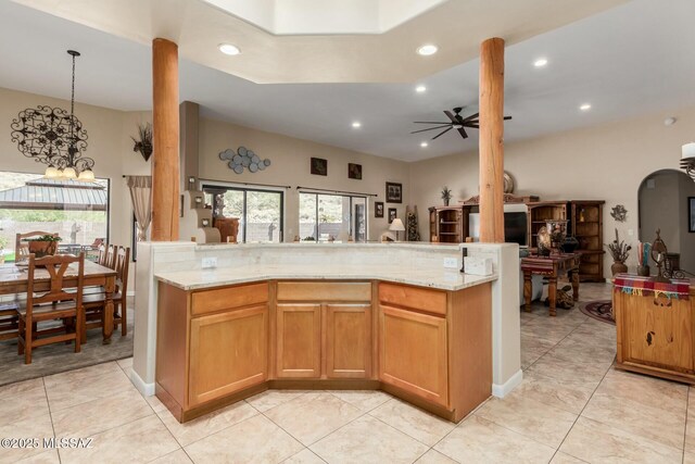 kitchen with recessed lighting, open floor plan, and ceiling fan with notable chandelier