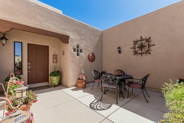 view of patio featuring outdoor dining space
