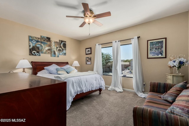 bedroom with carpet flooring, baseboards, and ceiling fan