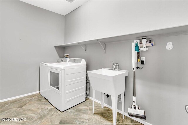 3156 S Three D Ct, Tucson, AZ 85713 - washroom featuring washer and dryer and baseboards