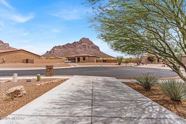 3156 S Three D Ct, Tucson, AZ 85713 - view of concrete driveway with a mountain view