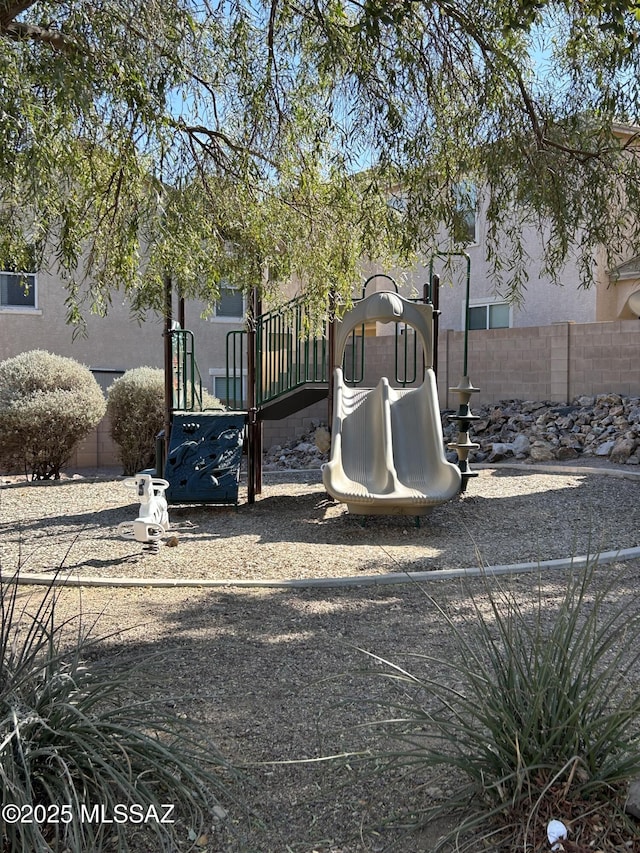community play area featuring fence