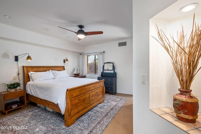 bedroom featuring ceiling fan and visible vents