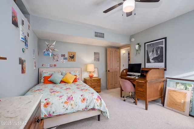 bedroom featuring ceiling fan, light carpet, and visible vents