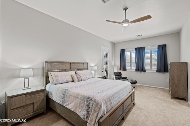 bedroom featuring a ceiling fan, baseboards, visible vents, and light colored carpet