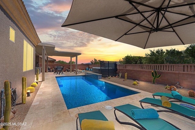 view of swimming pool featuring a fenced backyard, a patio, a fenced in pool, and outdoor dining space
