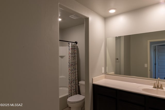 bathroom featuring toilet, shower / bath combo, and vanity
