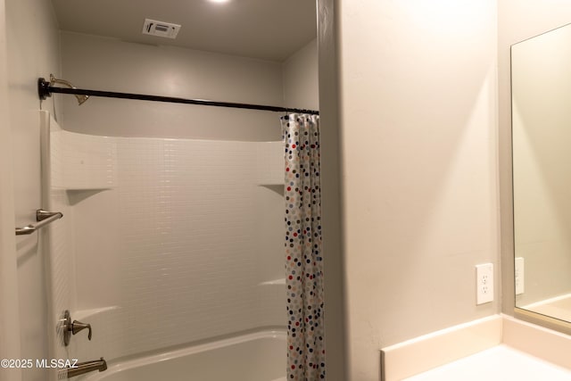 full bathroom featuring visible vents and shower / bath combination with curtain