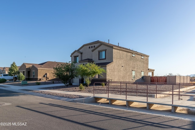 view of front of house with stucco siding