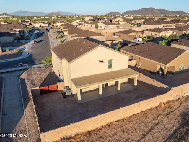 aerial view with a mountain view and a residential view