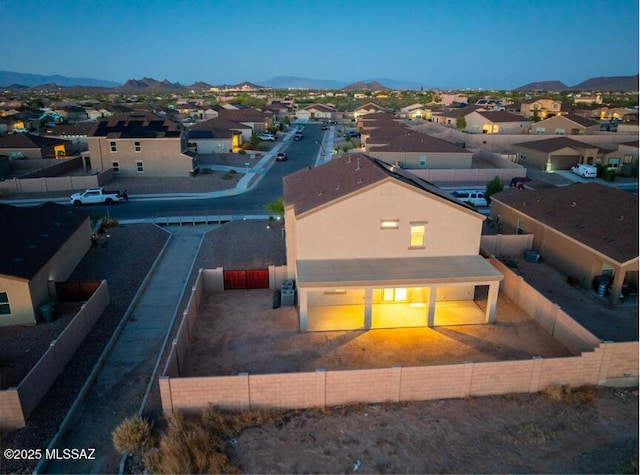 bird's eye view featuring a residential view and a mountain view