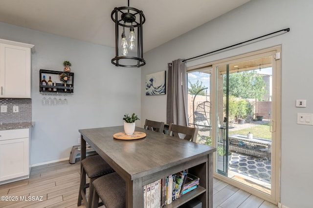 894 E Prairie Field Ln, Sahuarita, AZ 85629 - dining area featuring light wood finished floors and baseboards