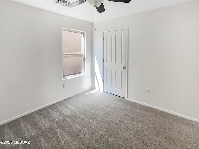 11155 E Vail Vista Ct, Tucson, AZ 85747 - carpeted spare room featuring a ceiling fan and baseboards