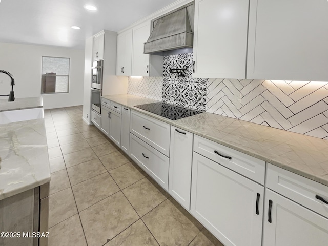 11155 E Vail Vista Ct, Tucson, AZ 85747 - kitchen featuring custom exhaust hood, black electric cooktop, white cabinets, backsplash, and a sink