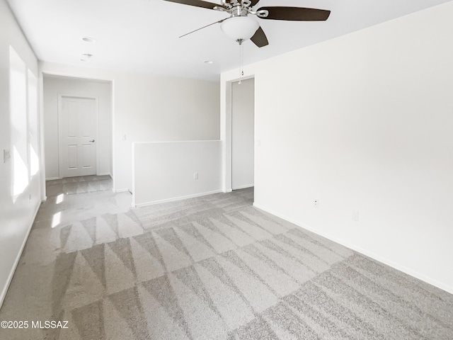 11155 E Vail Vista Ct, Tucson, AZ 85747 - unfurnished room with ceiling fan, carpet flooring, and baseboards