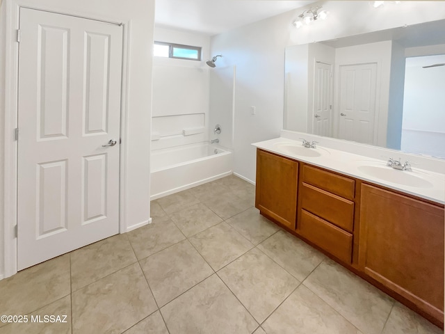 11155 E Vail Vista Ct, Tucson, AZ 85747 - full bath with tile patterned floors, shower / washtub combination, double vanity, and a sink