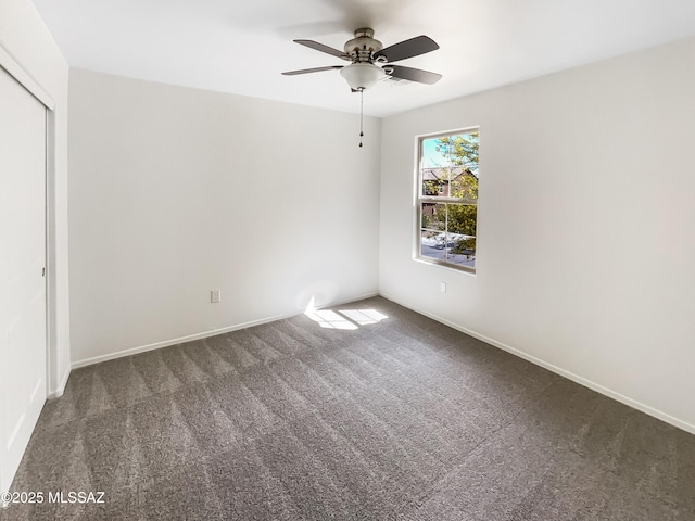 11155 E Vail Vista Ct, Tucson, AZ 85747 - unfurnished bedroom featuring a ceiling fan, carpet flooring, baseboards, and a closet
