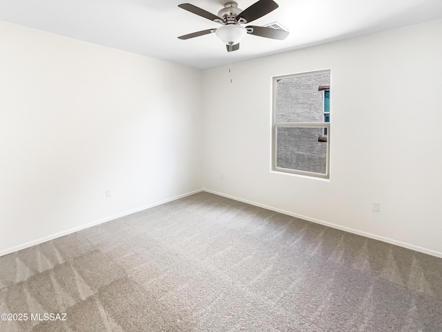 11155 E Vail Vista Ct, Tucson, AZ 85747 - empty room with baseboards, visible vents, ceiling fan, and carpet flooring