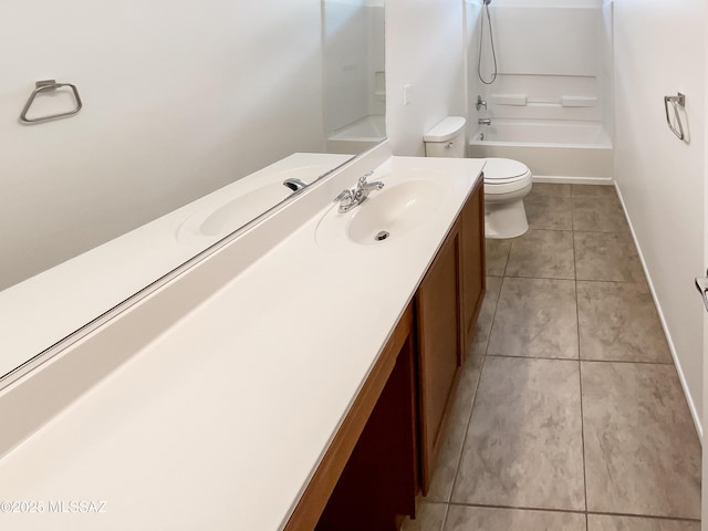 11155 E Vail Vista Ct, Tucson, AZ 85747 - bathroom featuring vanity, bathing tub / shower combination, tile patterned floors, toilet, and baseboards