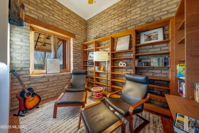 221 Calle Coco, Nogales, AZ 85621 - living area featuring wood finished floors and brick wall