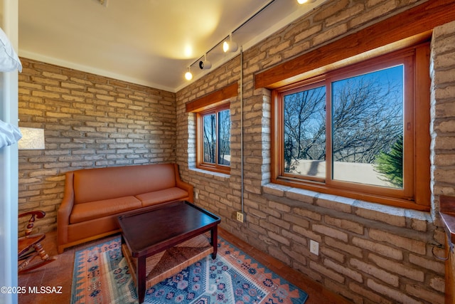 221 Calle Coco, Nogales, AZ 85621 - living area featuring brick wall
