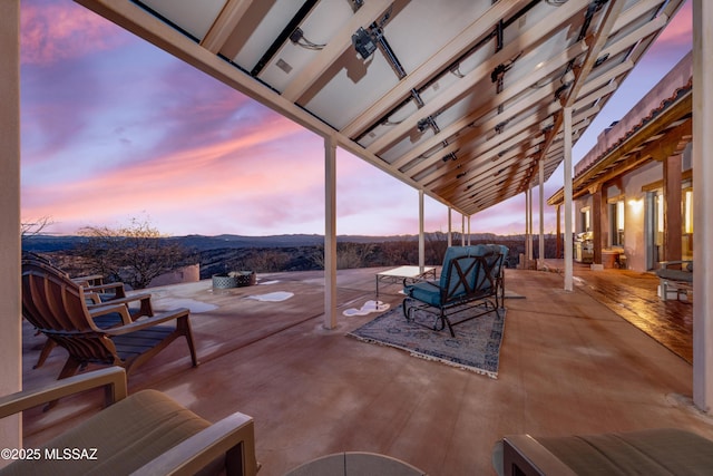 221 Calle Coco, Nogales, AZ 85621 - patio terrace at dusk with a mountain view