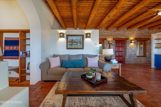 221 Calle Coco, Nogales, AZ 85621 - living area with beam ceiling, arched walkways, built in features, and wood ceiling