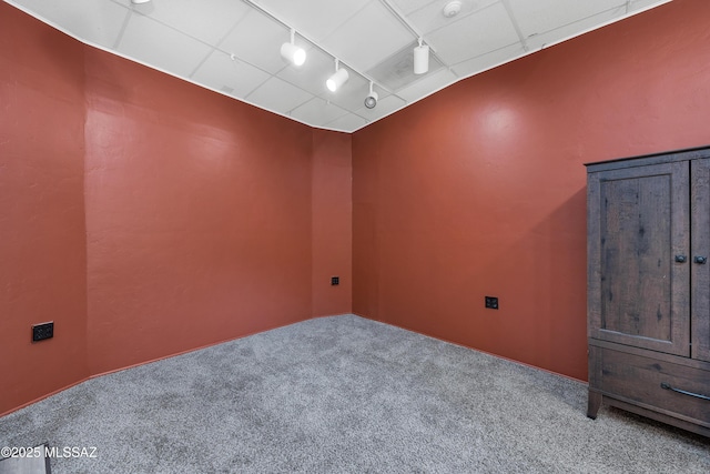 spare room featuring carpet floors