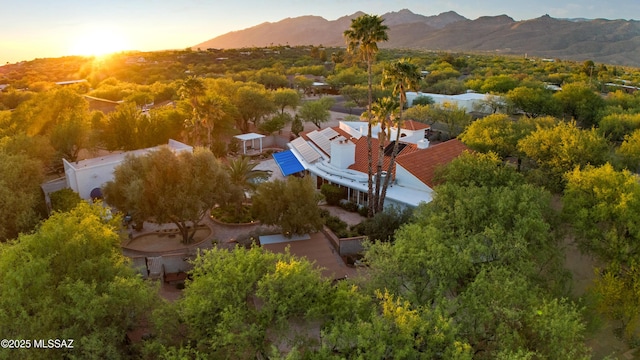 aerial view at dusk with a mountain view