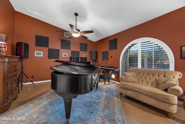 playroom featuring a ceiling fan, visible vents, baseboards, tile patterned floors, and high vaulted ceiling