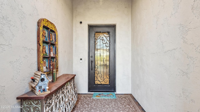 2230 E Thunder Bluff Dr, Green Valley, AZ 85614 - view of exterior entry featuring stucco siding