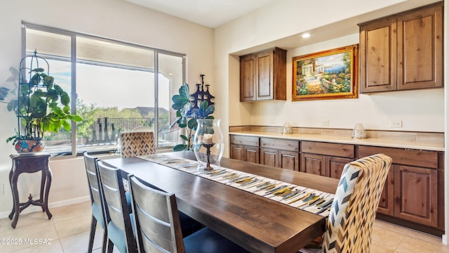 2230 E Thunder Bluff Dr, Green Valley, AZ 85614 - dining room featuring light tile patterned flooring and plenty of natural light