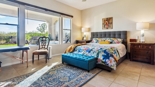 2230 E Thunder Bluff Dr, Green Valley, AZ 85614 - tiled bedroom with baseboards