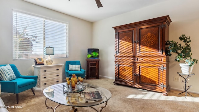 2230 E Thunder Bluff Dr, Green Valley, AZ 85614 - living area featuring carpet, ceiling fan, and baseboards