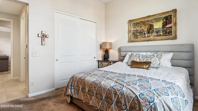 2230 E Thunder Bluff Dr, Green Valley, AZ 85614 - bedroom with carpet flooring, baseboards, and a closet
