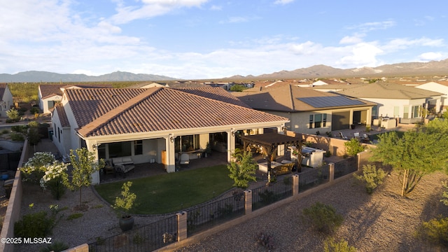 2230 E Thunder Bluff Dr, Green Valley, AZ 85614 - back of house featuring a mountain view, a fenced backyard, a residential view, and a patio area
