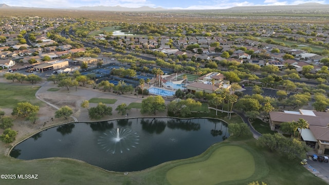 2230 E Thunder Bluff Dr, Green Valley, AZ 85614 - aerial overview of property's location with nearby suburban area and a water and mountain view