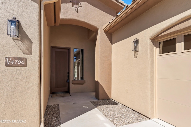 4706 W Cholla Bluff Dr, Marana, AZ 85658 - doorway to property featuring stucco siding
