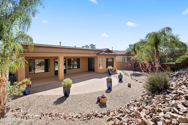 4706 W Cholla Bluff Dr, Marana, AZ 85658 - view of front facade with stucco siding and a patio area